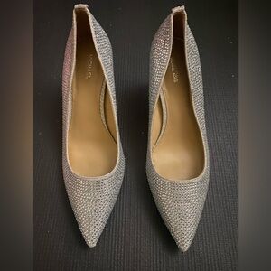 Michael Kors silver sparkly heels.